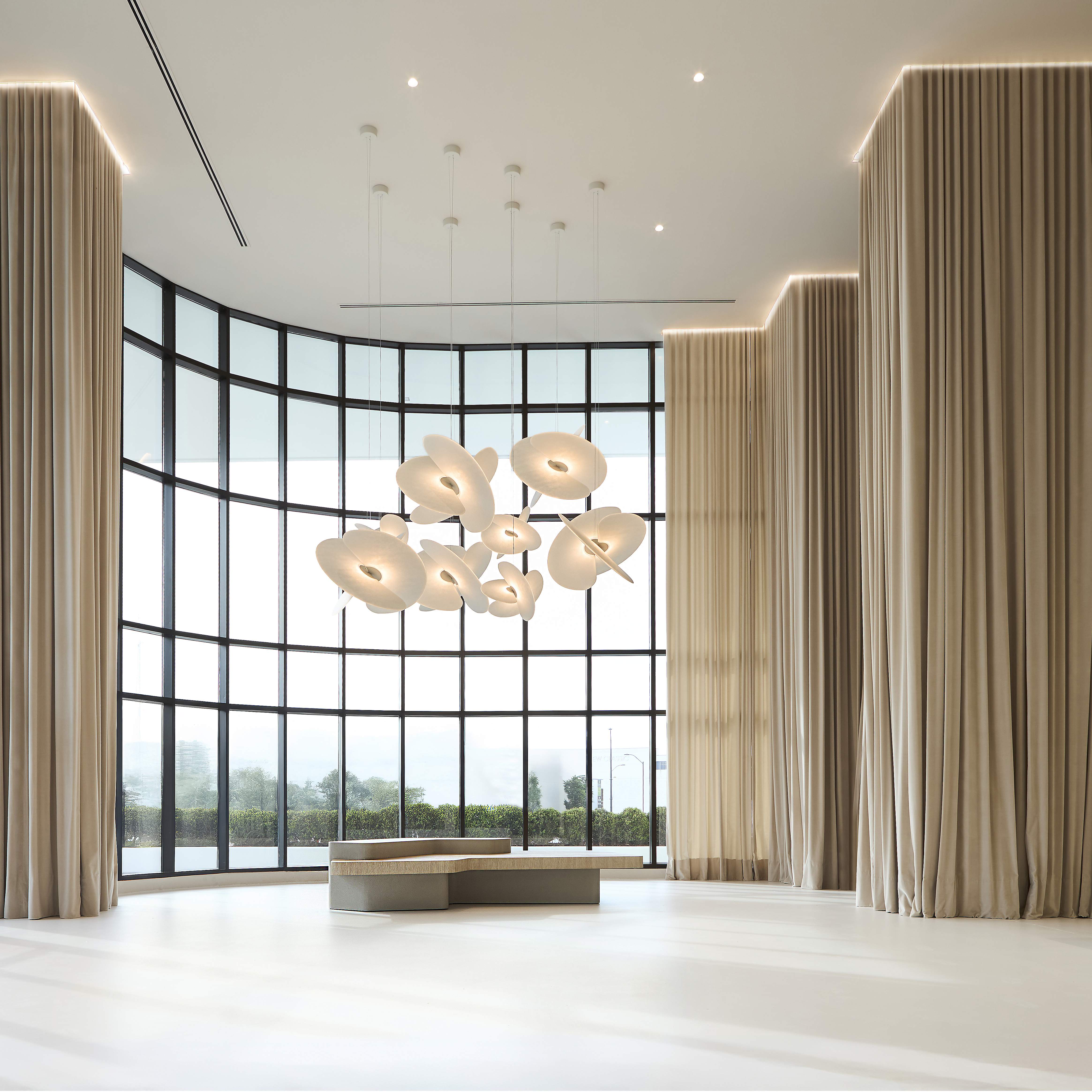 High Point showroom interior with curved window wall